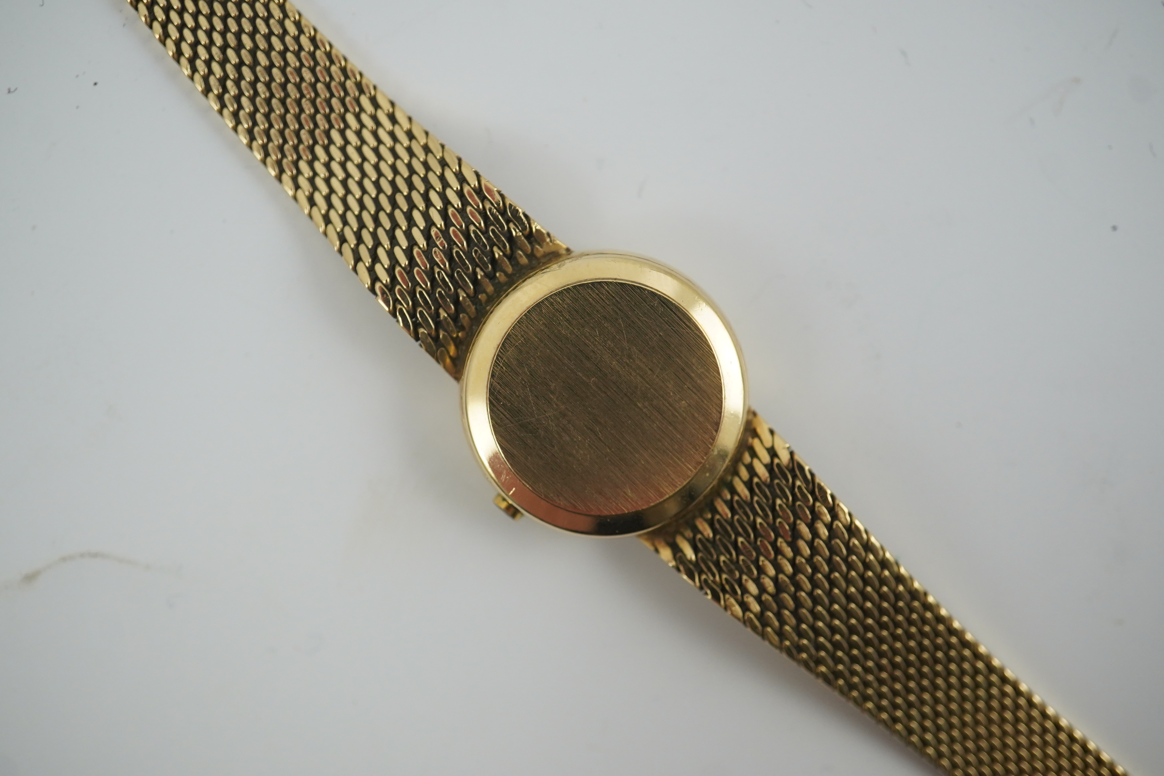 A lady's early 1980's 9ct gold Tissot quartz wrist watch with textured 9ct gold associated bracelet